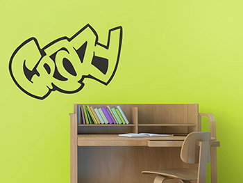 Schriftzug CRAZY als Wandtattoo ber dem Schreibtisch