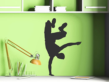 Wandaufkleber mit Breakdance auf grüner Wandfläche