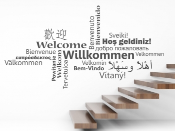 Willkommen weltweit als internationale Begrung im Flur